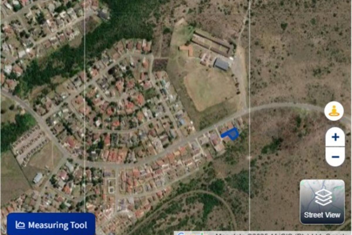 An aerial satellite view showing the location of the vacant residential plot within the surrounding neighborhood context.