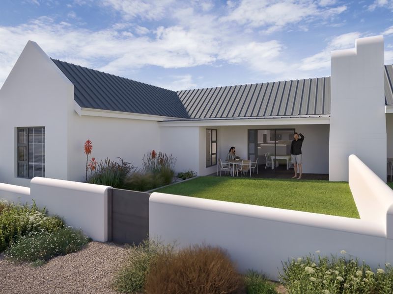 A modern rear exterior view featuring a covered patio, manicured lawn, and clean white architectural lines with a durable metal roof.
