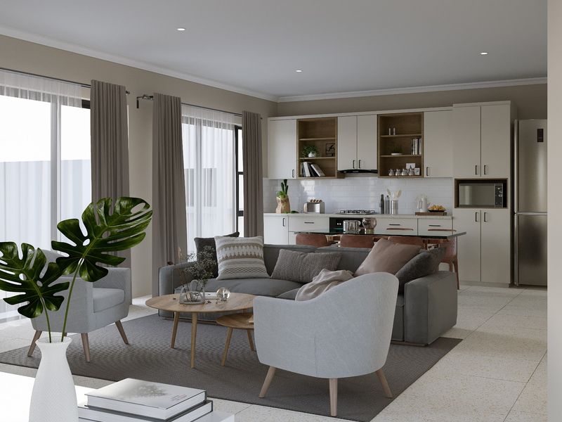 Modern open-plan living area featuring a contemporary kitchen with built-in appliances, subway tile backsplash, and seamless flow to the lounge space.
