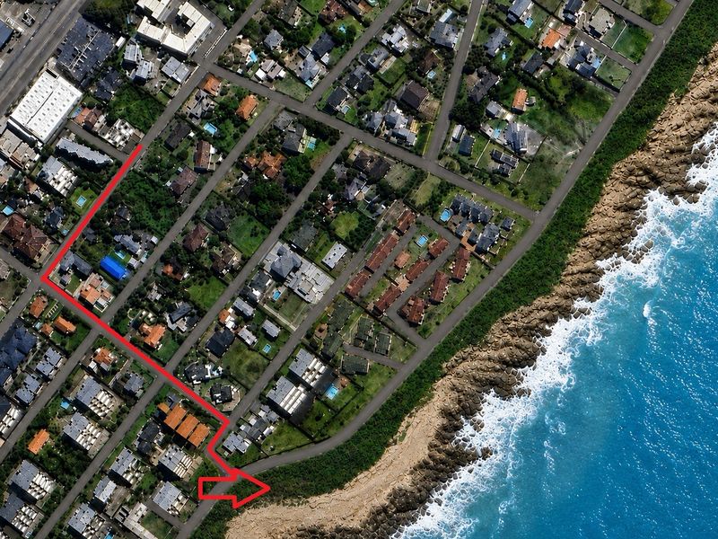 An aerial view showing the coastal residential neighborhood layout with a red line indicating the property location and access route.