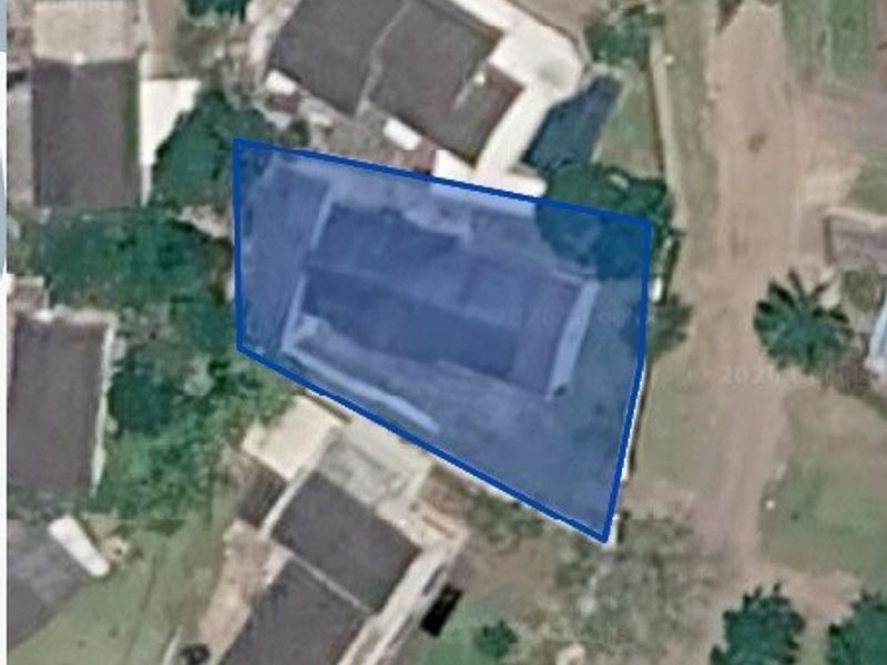 An aerial satellite view showing the property footprint and surrounding residential neighborhood layout.