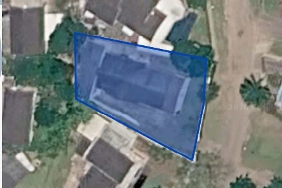 An aerial satellite view showing the property footprint and surrounding residential neighborhood layout.