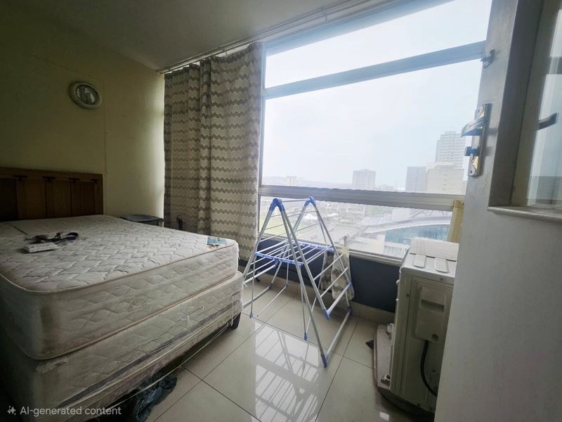 A bedroom featuring large floor-to-ceiling windows with city views, tiled flooring, and a built-in air conditioning unit.