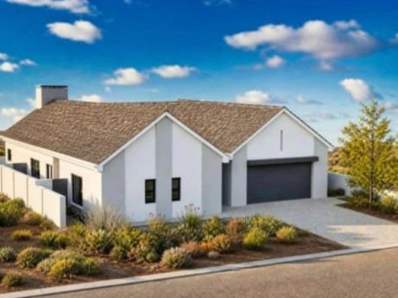 A modern single-story residential house featuring a tiled roof, integrated garage, and perimeter walling, set within a landscaped garden.
