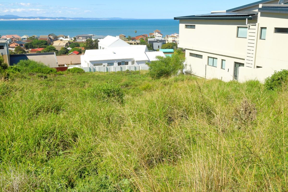 A view of the coastal landscape and surrounding residential area from the elevated vacant residential land.