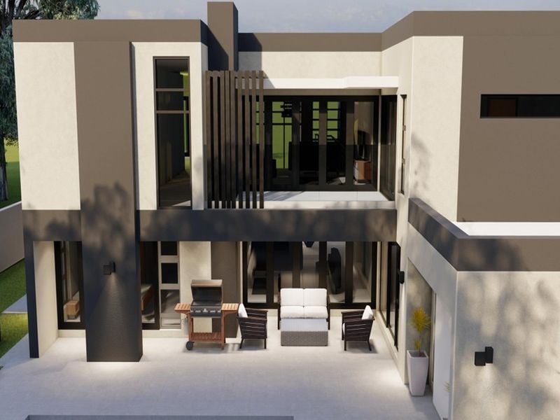 A modern two-story residential rear elevation featuring a paved patio, balcony, and contemporary architectural design with large glass sliding doors.