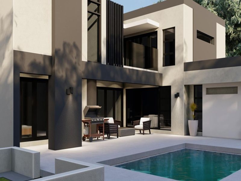 Modern architectural rear elevation featuring a swimming pool, covered patio area, and large glass sliding doors providing seamless indoor-outdoor flow.