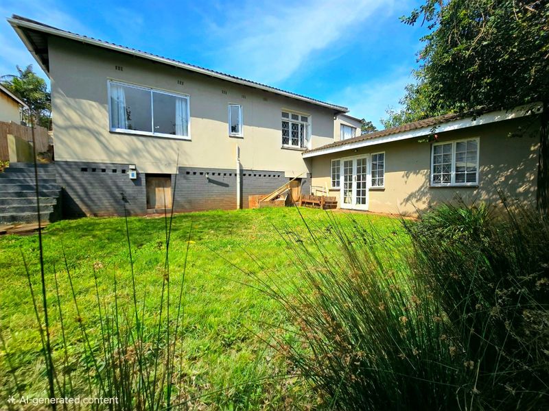 Rear view of the house featuring a lawn, concrete stairs, and a mix of sliding and french door access points.