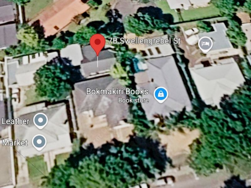An aerial view of the property showing the roof structure and surrounding neighbourhood context.
