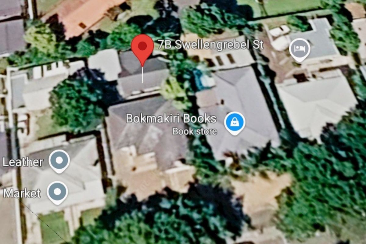 An aerial view of the property showing the roof structure and surrounding neighbourhood context.