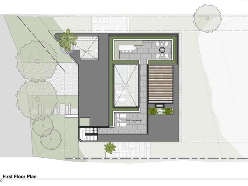Architectural first floor plan showing the layout of the roof entertainment area and outdoor terrace space.