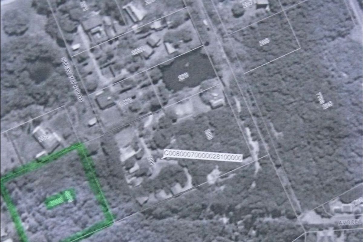 An aerial view showing the cadastral boundaries and layout of the residential land parcel.
