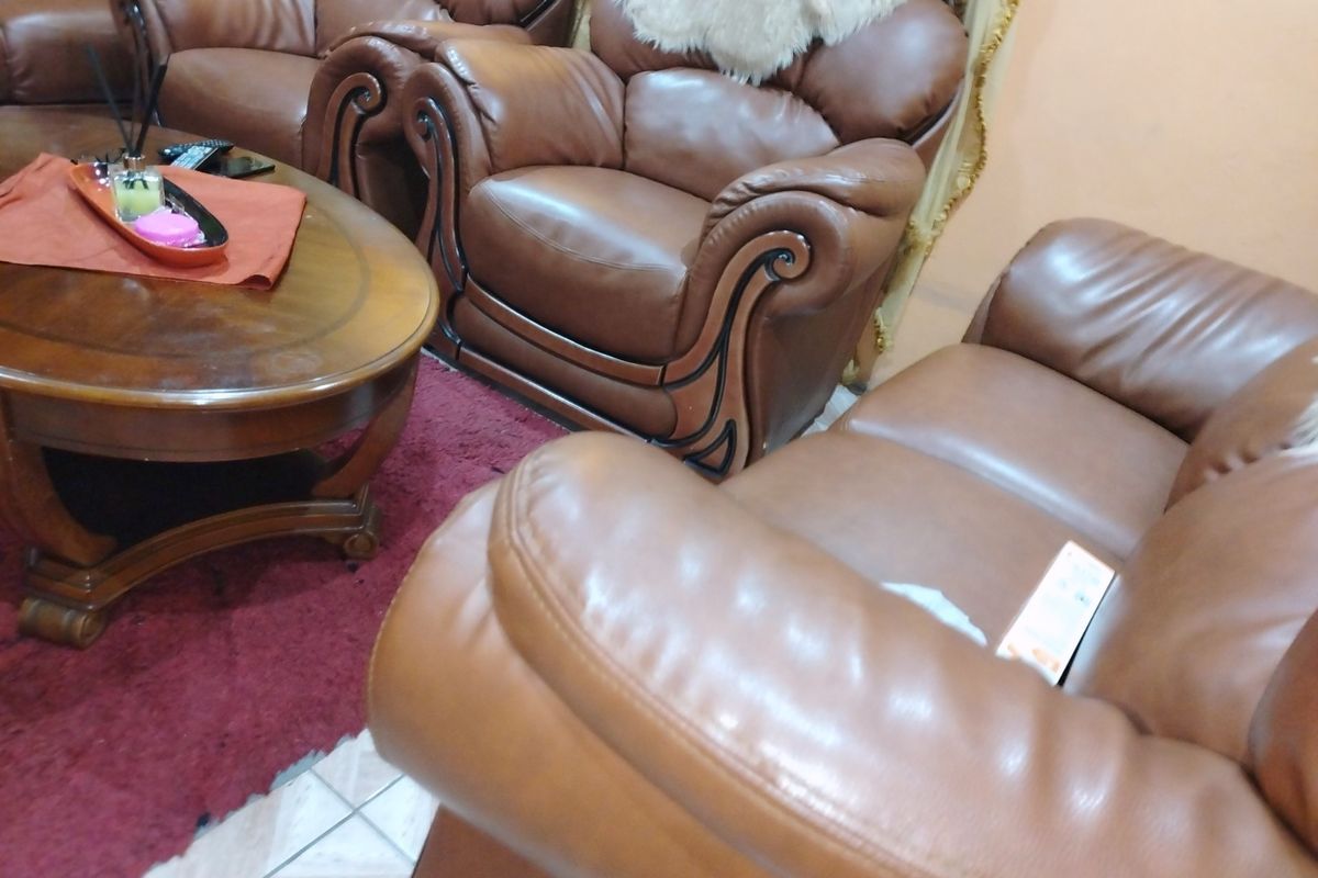 A living room area featuring tiled flooring.