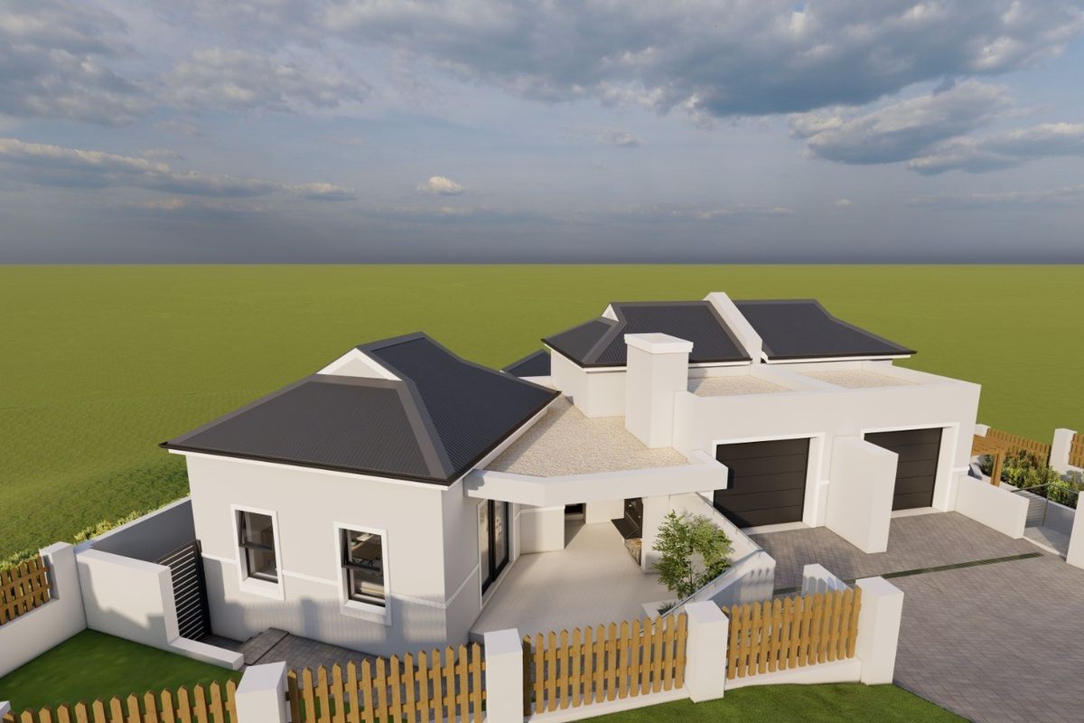 Aerial view of a modern residential house featuring a hipped roof, double garage, paved driveway, and a covered patio area.