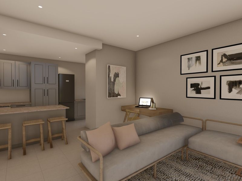 Modern open-plan living area featuring a contemporary kitchen with built-in cabinetry, a breakfast bar, and recessed lighting, seamlessly integrated with a comfortable lounge space.