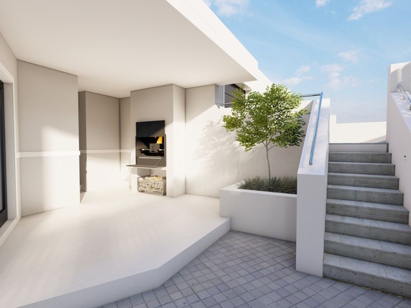 A modern outdoor patio featuring a built-in braai, concrete staircase with metal handrail, and a raised planter box, finished with clean tiled and paved surfaces.