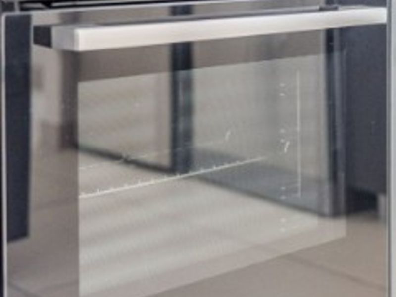 A modern built-in Bosch oven integrated into the kitchen cabinetry.