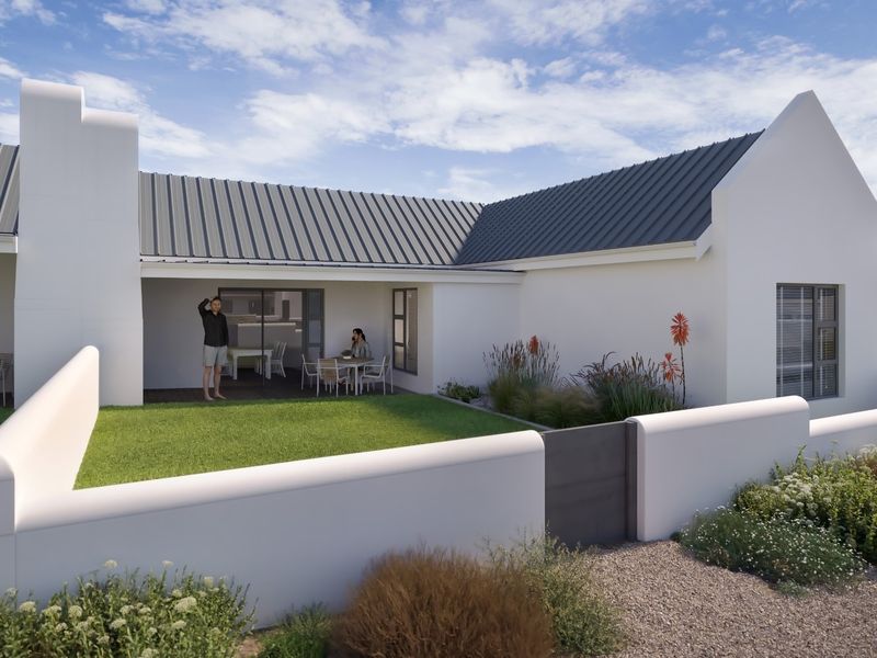 A modern rear exterior view featuring a covered patio, metal roofing, and a well-maintained garden with a boundary wall.