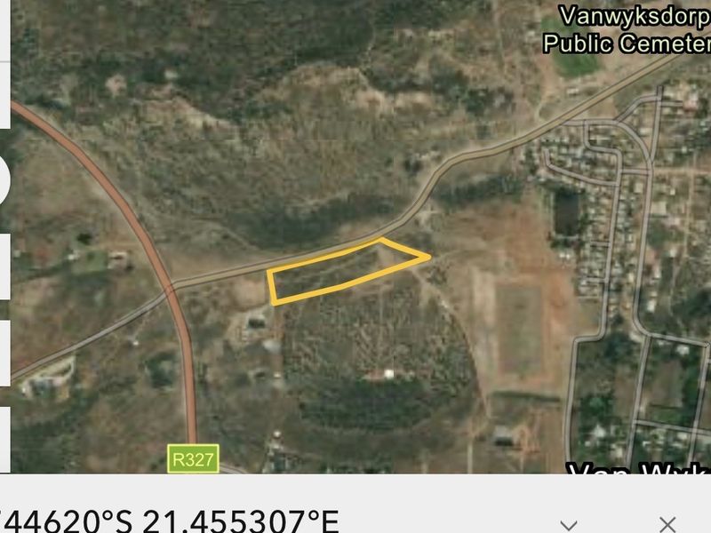 An aerial satellite view showing the property boundary outline in a rural landscape setting near the R327 road.