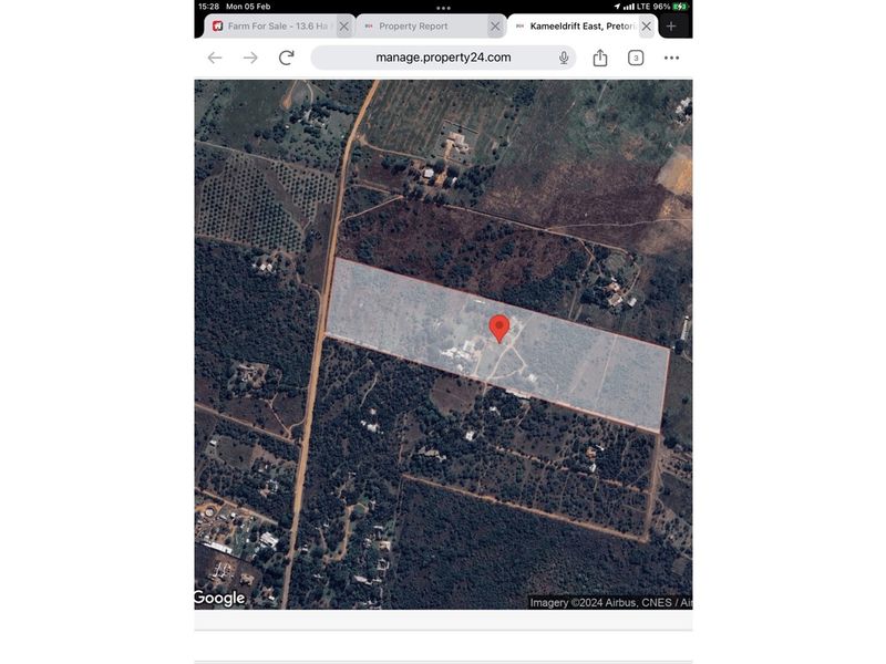 An aerial satellite view showing the location and boundaries of the farm property.
