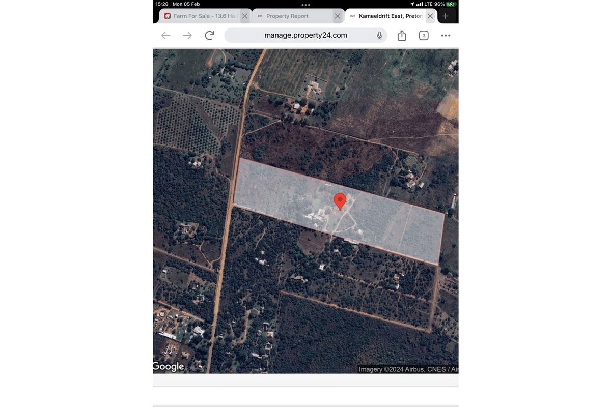 An aerial satellite view showing the location and boundaries of the farm property.