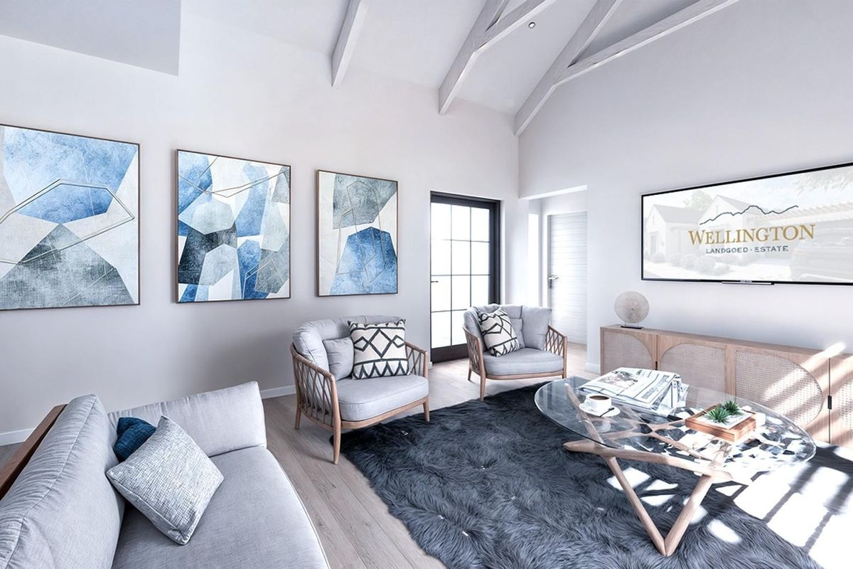 A bright and modern living room featuring a high vaulted ceiling with exposed rafters, light wood-look flooring, and a classic french door.