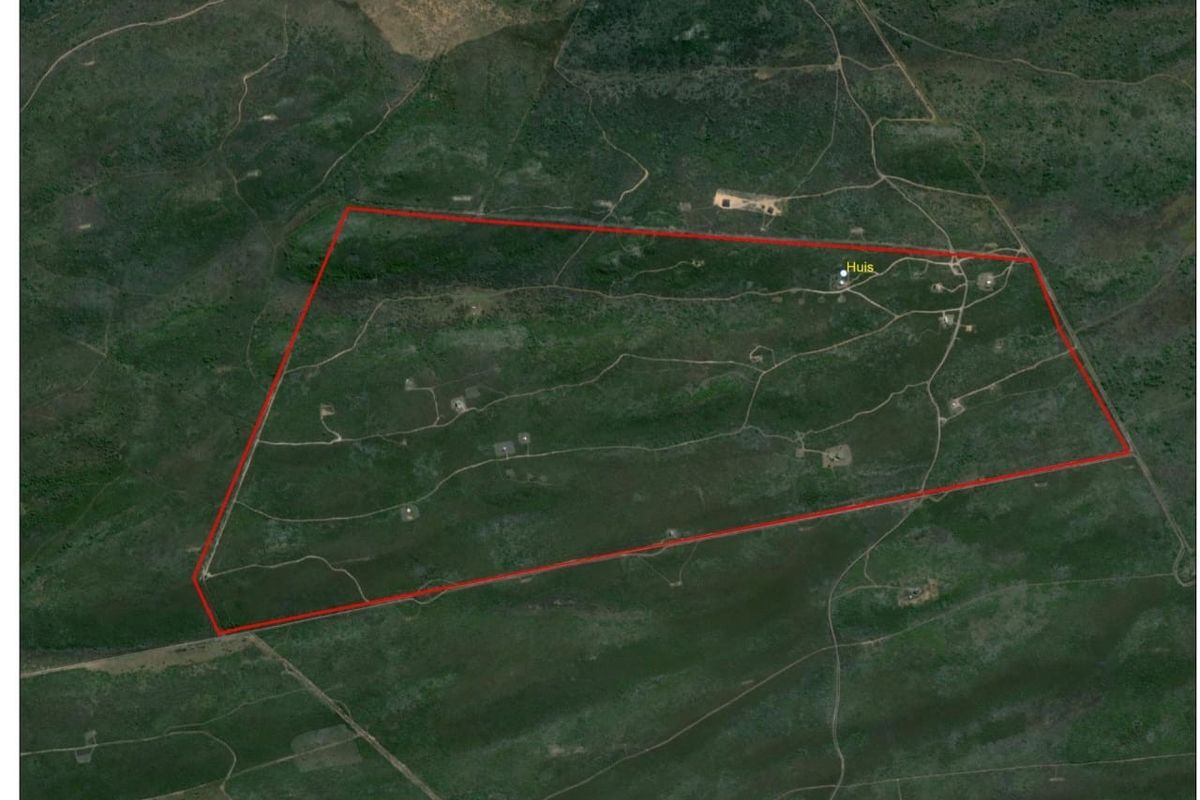 Aerial satellite view showing the property boundary and access tracks within a large rural or estate plot.