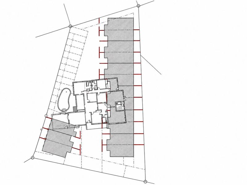 Architectural site plan showing the layout of the property, building footprint, and surrounding outdoor space.