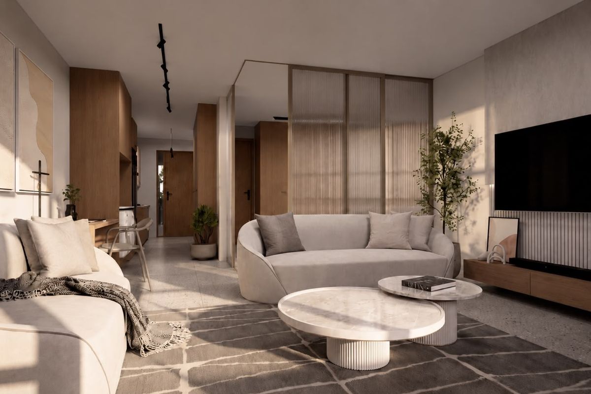 Modern open-plan living area featuring high-end finishes, terrazzo flooring, and a stylish fluted glass partition, creating a sophisticated and well-lit interior space.
