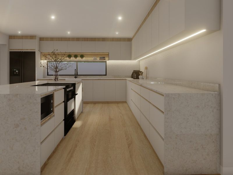 Modern kitchen featuring stone countertops, integrated cabinetry, built-in appliances, and recessed lighting in a clean, minimalist design.