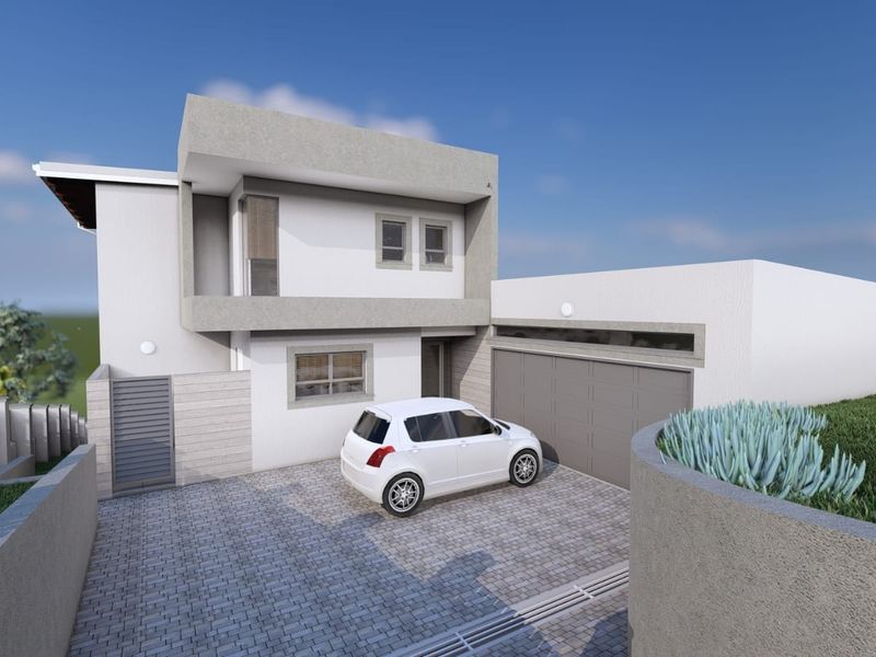 A modern two-story residential property featuring a paved driveway, double garage, and a clean, contemporary architectural design.
