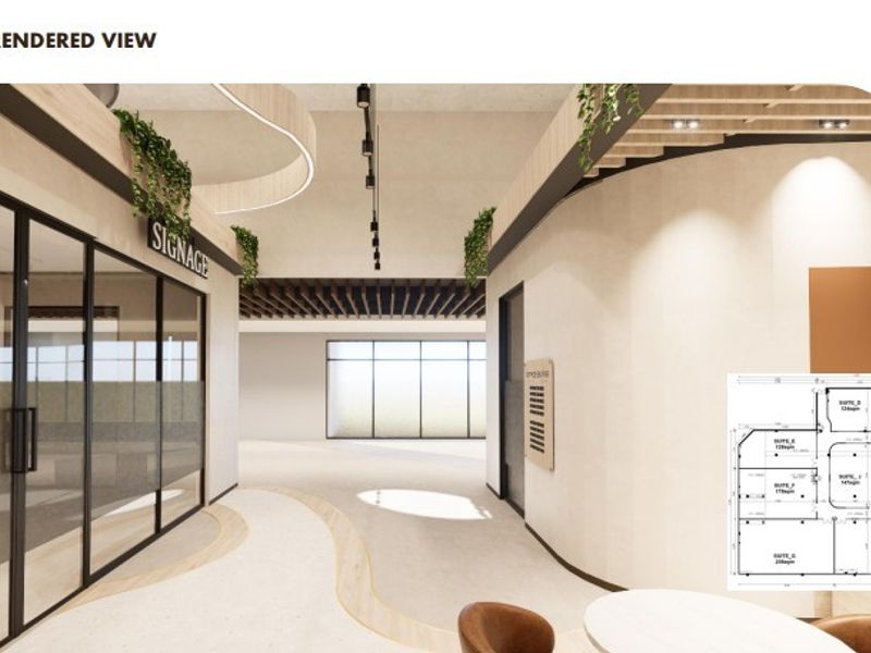 A modern office interior rendering featuring glass partitions, track lighting, and a clean, contemporary design layout.