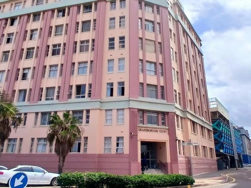 Exterior view of Grandborough Court, a multi-story apartment building featuring a classic facade with numerous windows and a prominent street-level entrance.