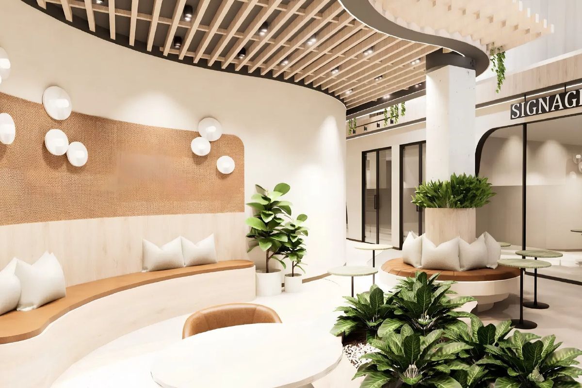 Modern office reception area featuring a curved built-in bench, slatted timber ceiling details, and contemporary glass partitions in a bright, professional workspace.