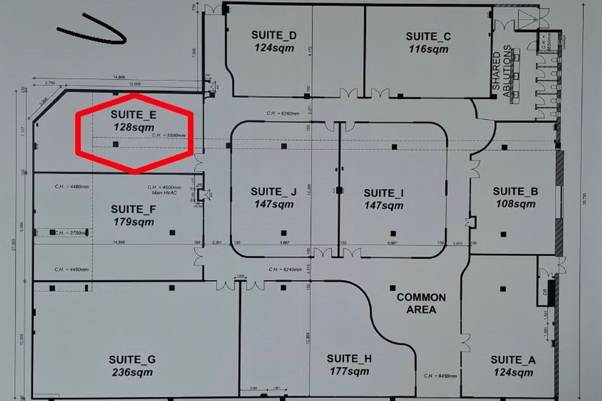 Architectural floor plan showing the layout of office suites and common areas within the commercial property.