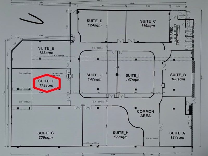 Architectural floor plan showing the layout of office suites and common areas within the commercial property.