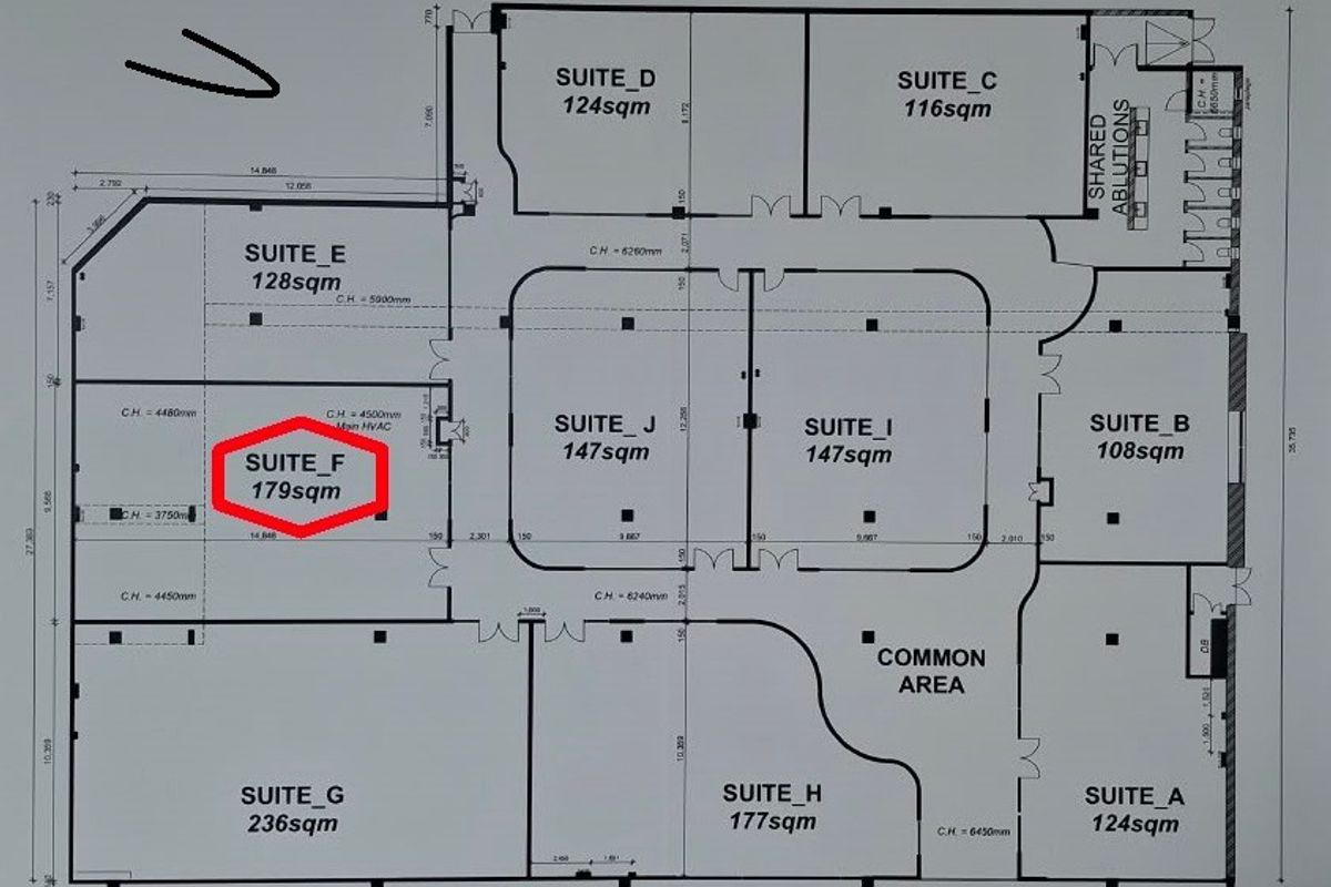 Architectural floor plan showing the layout of office suites and common areas within the commercial property.