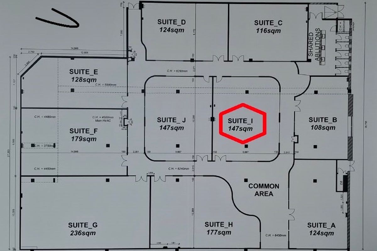 Architectural floor plan of an office building layout, highlighting Suite I with a total area of 147 square meters.