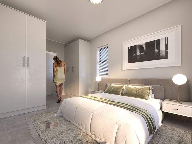 A modern, well-lit bedroom featuring neutral tones, built-in cupboards, and tiled flooring, creating a clean and contemporary living space.