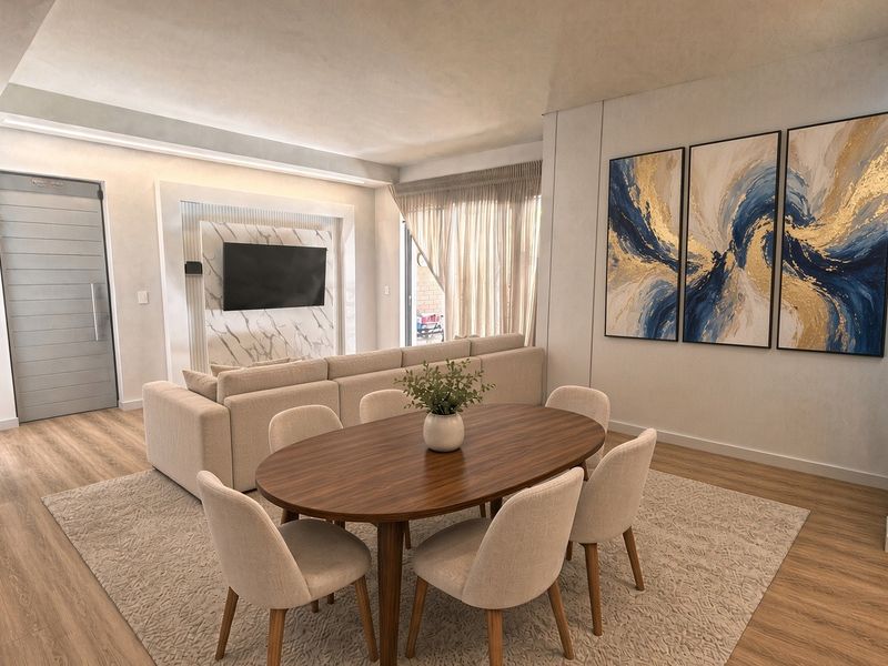 Modern open-plan living and dining area featuring high-quality laminate flooring, a sophisticated marble-look feature wall, and recessed ceiling details.