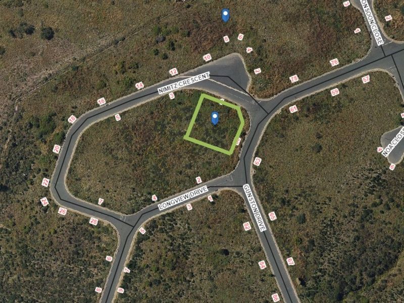 An aerial view showing the location and boundaries of the vacant residential plot situated at the corner of Nimitz Crescent and Gunston Drive.