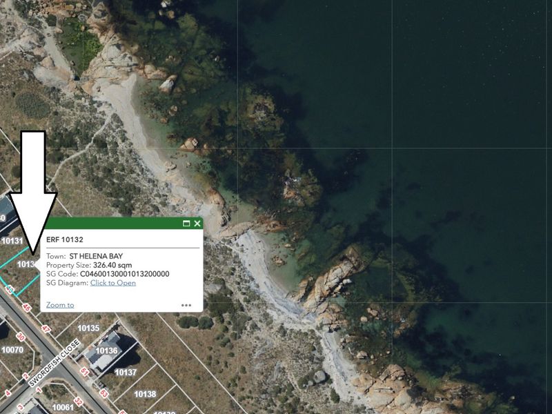 Aerial view of a vacant residential plot in St Helena Bay, highlighting its prime coastal location and proximity to the shoreline.