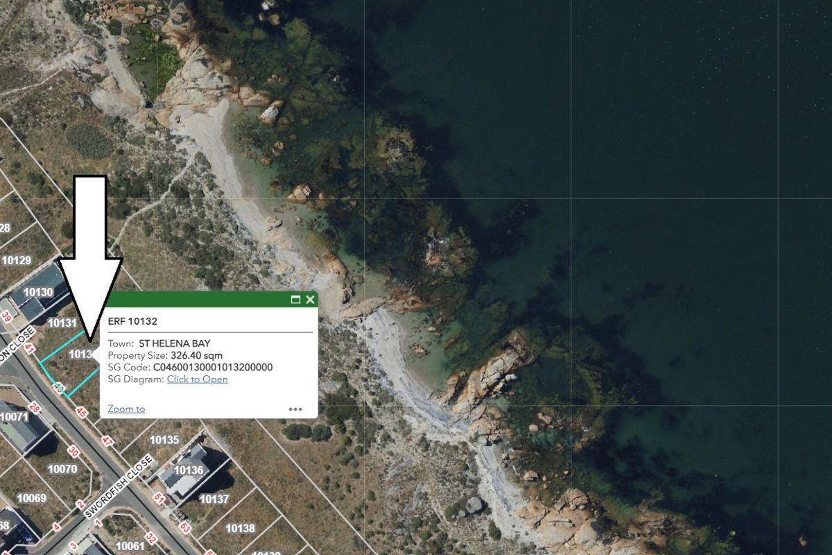 Aerial view of a vacant residential plot in St Helena Bay, highlighting its prime coastal location and proximity to the shoreline.