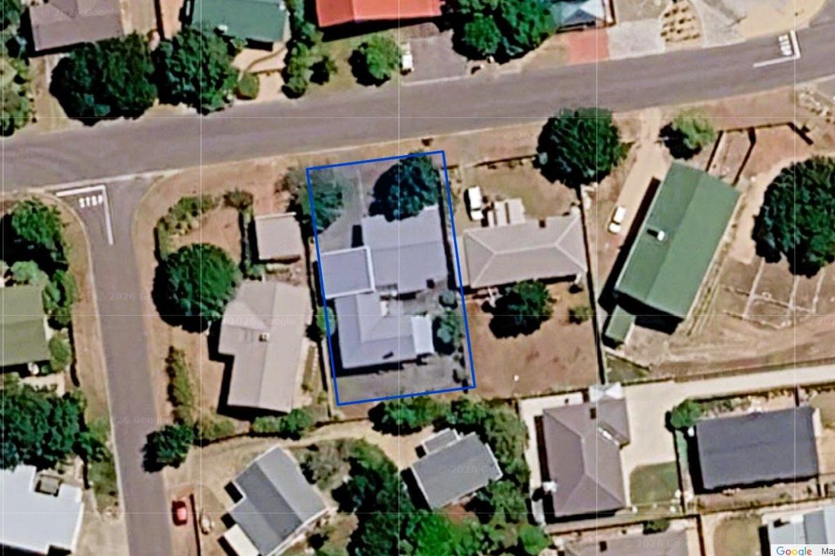 An aerial satellite view showing the property layout, roof structure, and surrounding residential context.