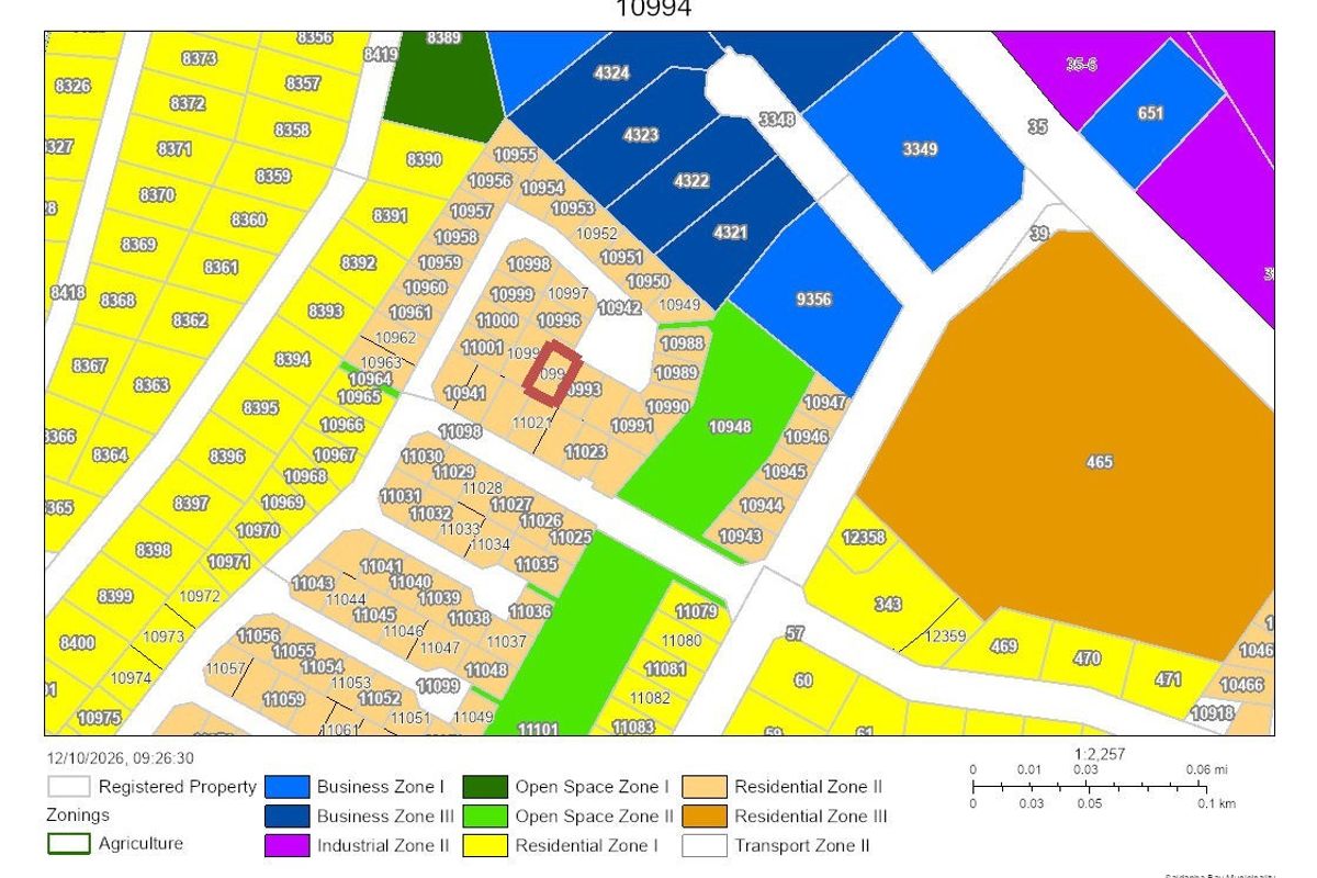 A zoning map illustrating the residential and business land use designations for the specified property area.