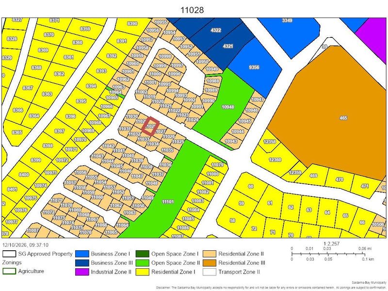 A detailed zoning map illustrating various residential, business, and open space zones within the municipal area.
