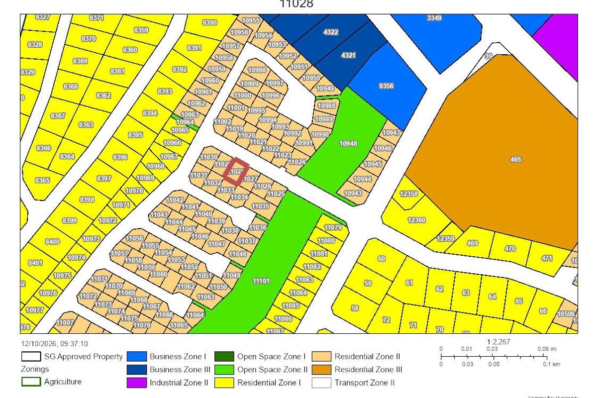 A detailed zoning map illustrating various residential, business, and open space zones within the municipal area.