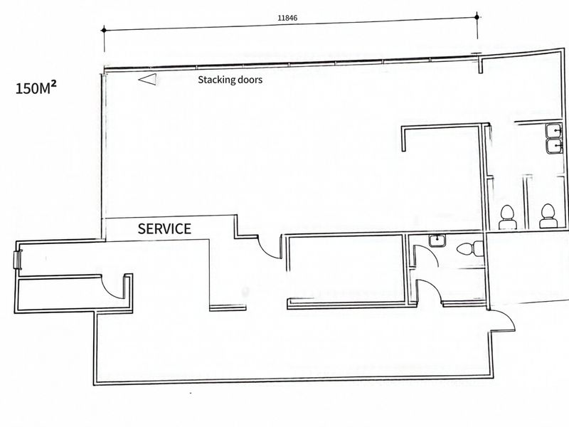 A clear architectural floor plan showing a 150 square meter commercial layout with stacking doors, service area, and multiple restroom facilities.