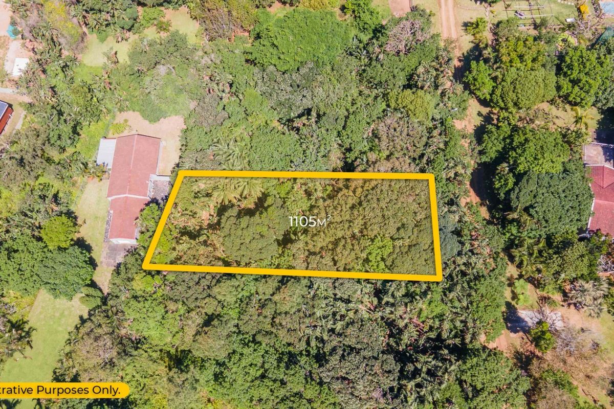 Aerial view of a 1105m² residential vacant land plot, heavily wooded and surrounded by established residential properties.