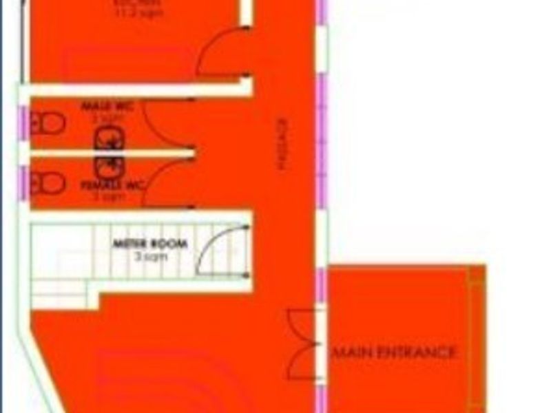 A ground floor plan layout for the office space, detailing the reception, kitchen, restrooms, and main entrance areas.